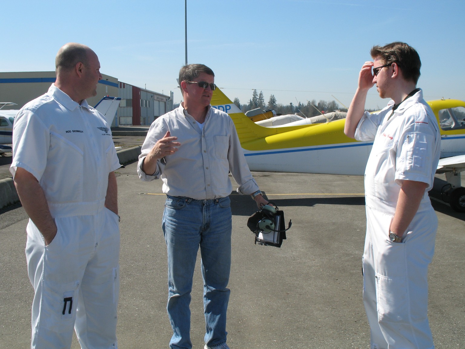 Student Pilot David Marshall with Flight Instructors Rod Giesbrecht and Philip Craig after his First Solo.  Both Rod and Phil shared in David's flight training.  Langley Flying School.